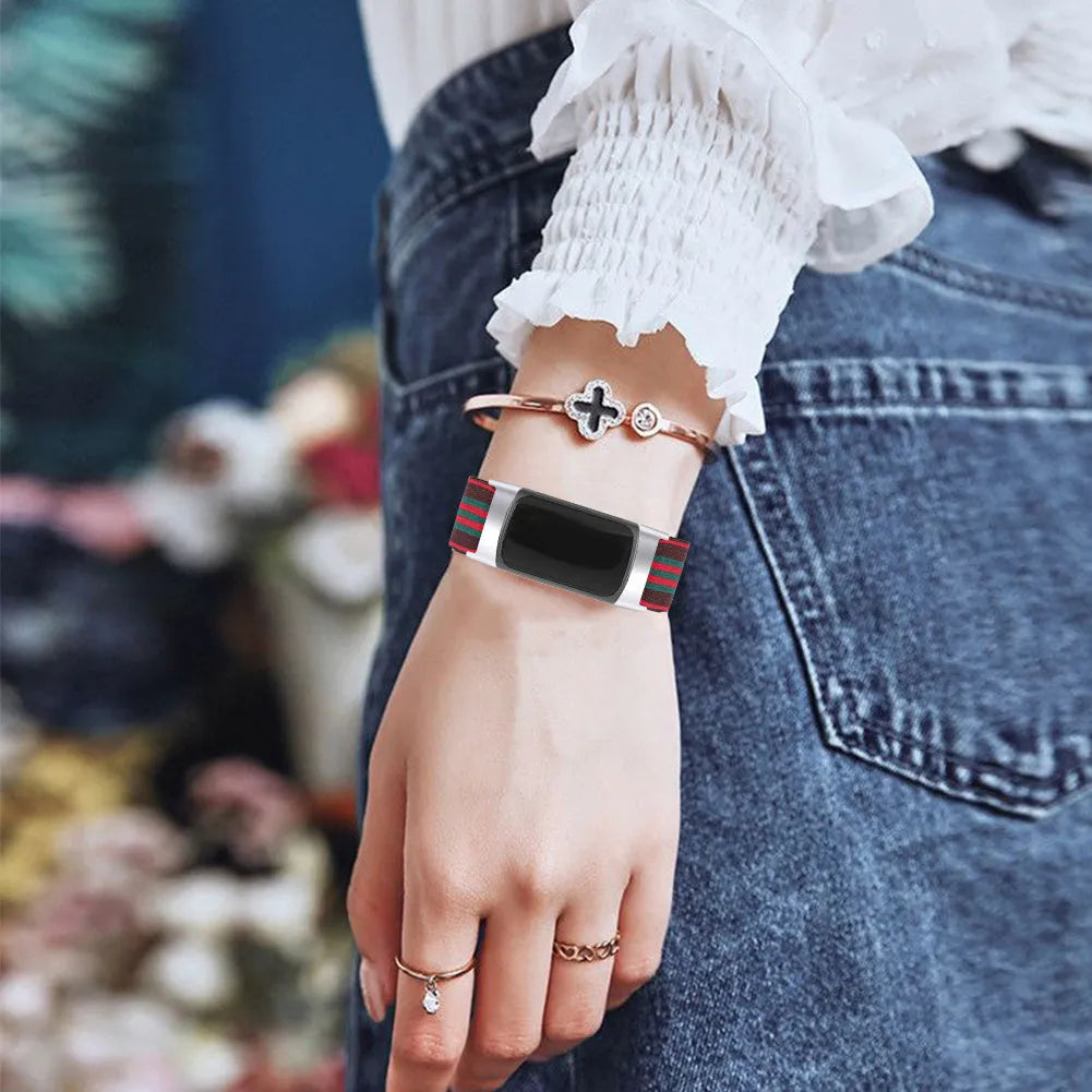 Printed elastic replacement watch strap for Fitbit Charge 6 showing adjustable fit and colour options