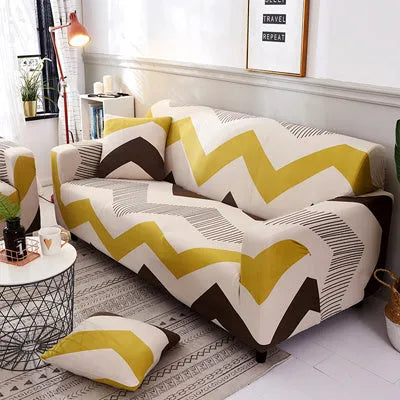 Printed geometric stretch sofa slipcover fitted on a three-seater sofa