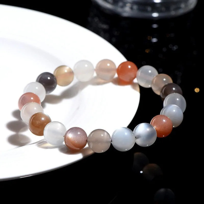 Natural moonstone bracelet with colourful moon light appearance showing 8mm beads in single circle formation