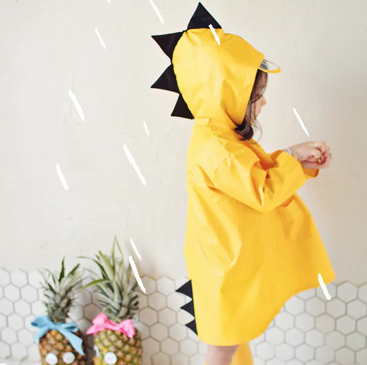 Dinosaur raincoat for kids in red or yellow, hooded design, sizes S to 3XL with size chart measurements