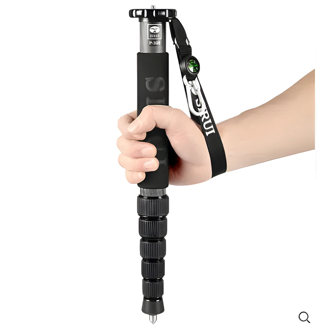 Black carbon fibre SLR camera monopod extended to full height