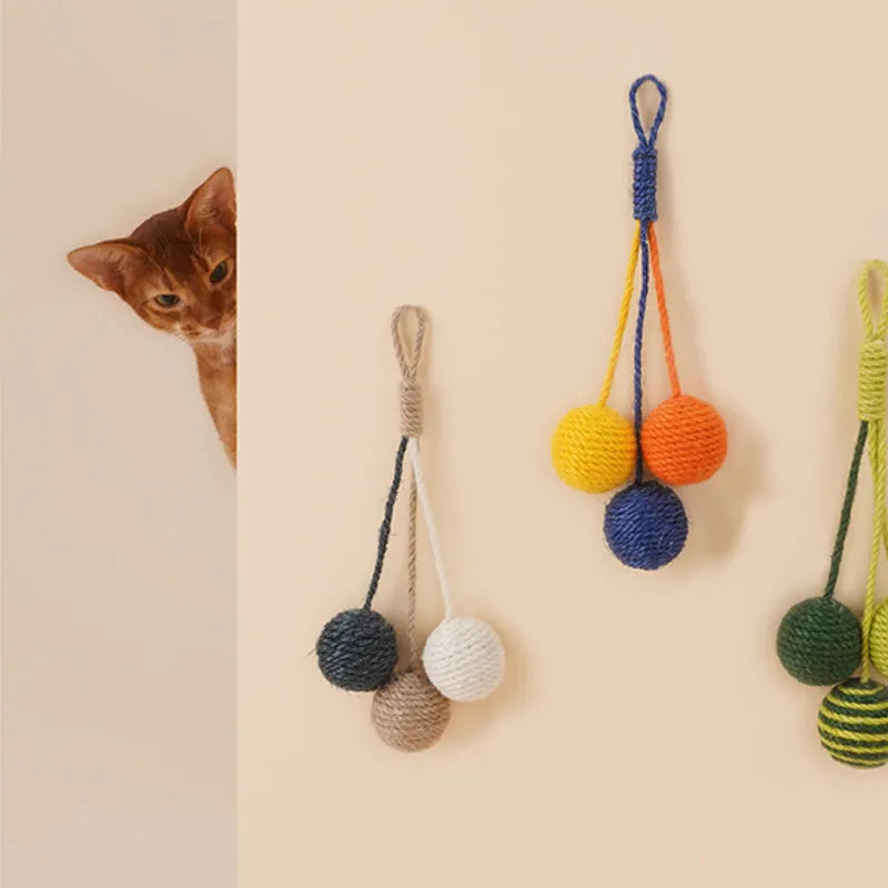 Cat toy set with teaser stick and assorted catnip balls in blue, green, red, yellow colours.