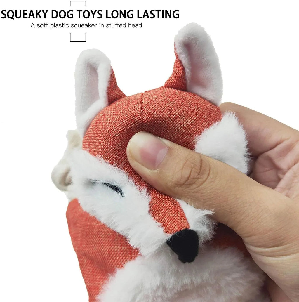 Brown plush fox dog toy with cotton rope limbs and embroidered eyes on a white background.