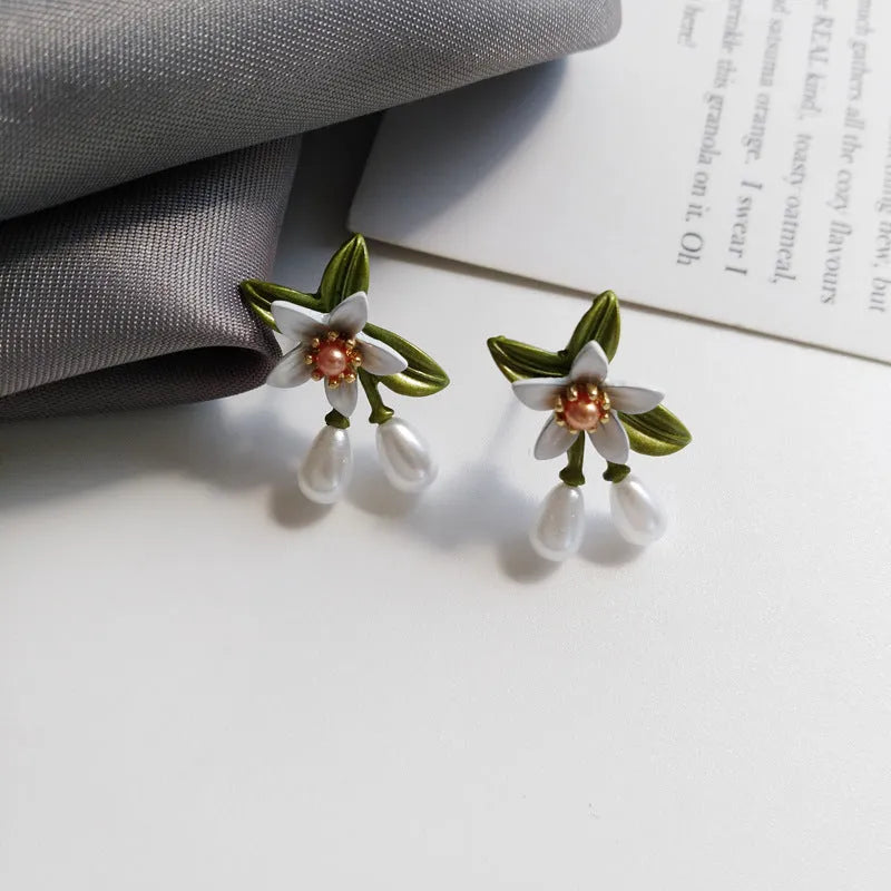 Alloy flower earrings with silver needle camellia detailing and contrasting colours