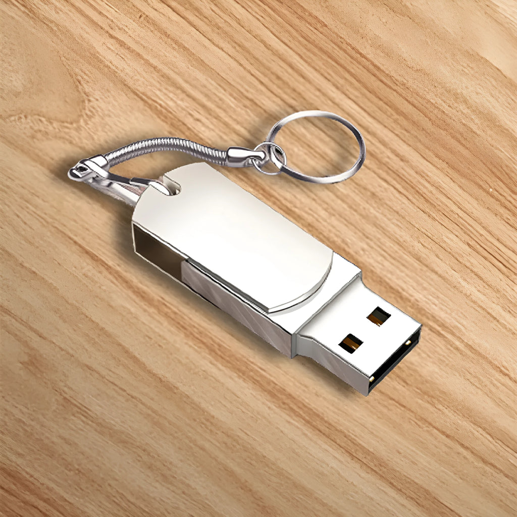 Small white metal rotating USB flash drive on a plain background