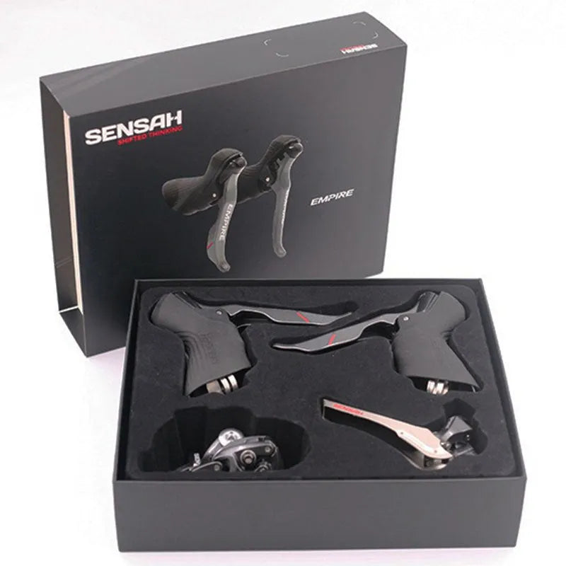 Road bike transmission kit with aluminium manual shift lever, front dial, and short leg rear derailleur.