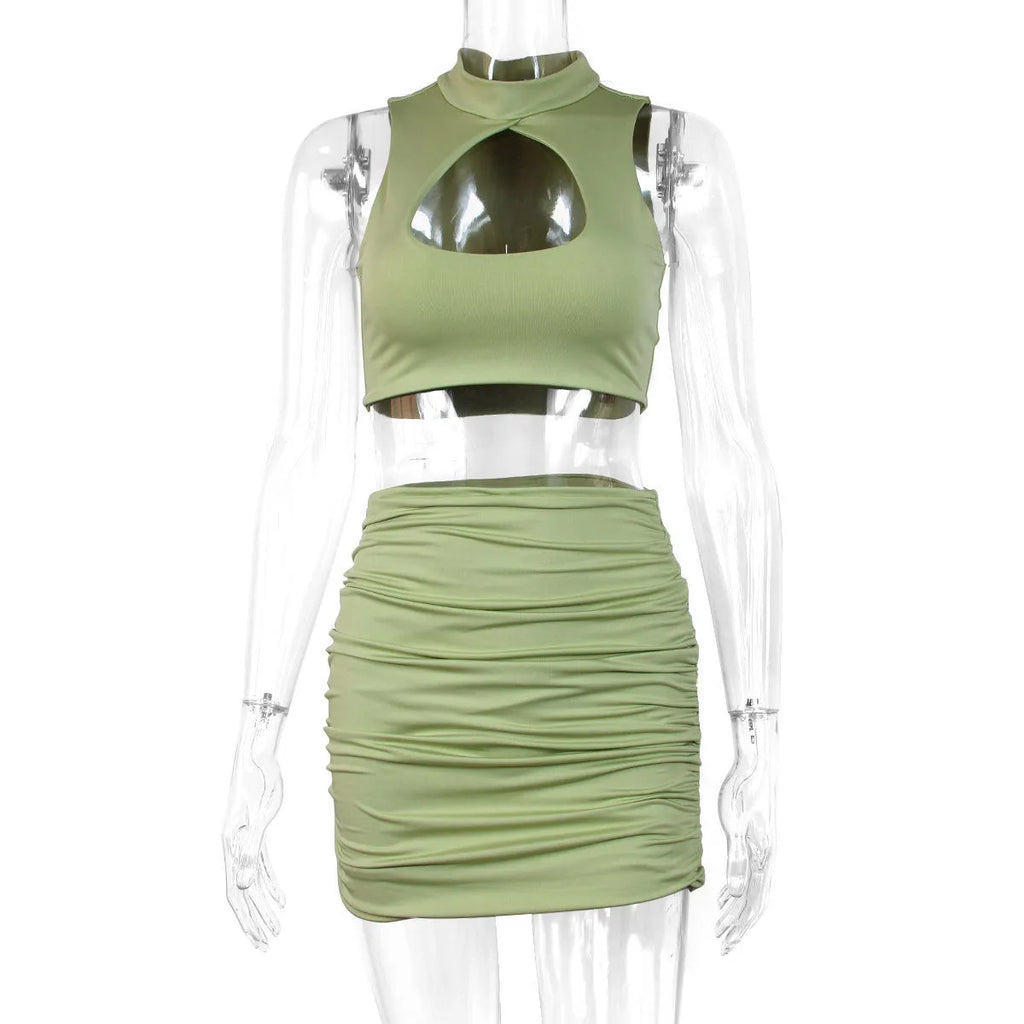 Light purple two-piece set with hollow vest top and hip skirt in elastic polyester fabric