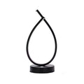Black and white drop-shaped USB bedside table lamp with touch or switch control.