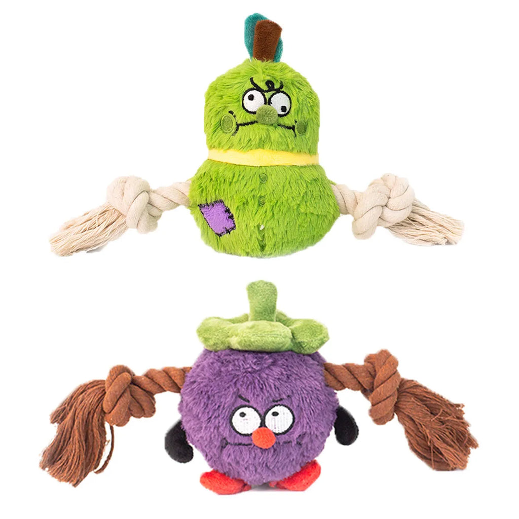 Green and purple interactive dog toy with plush rope knot for tug-of-war and dental cleaning features