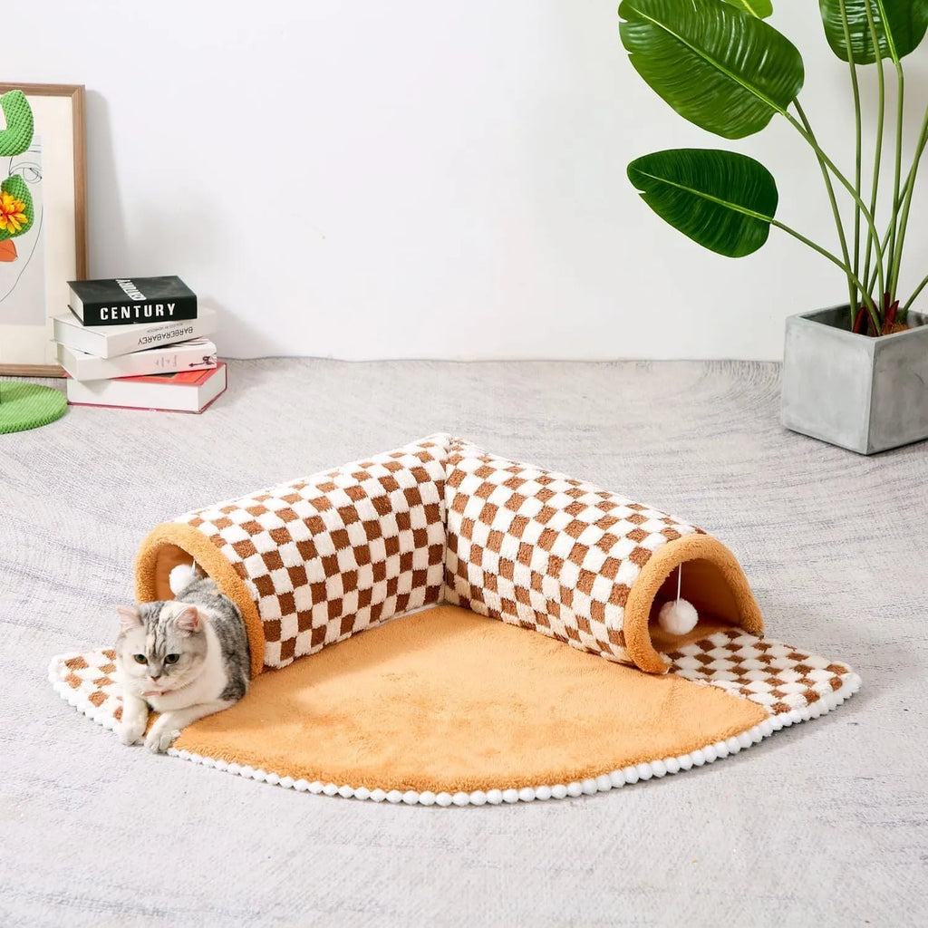 Fan-shaped plush pet bed with integrated tunnel in yellow, showing soft fabric and anti-slip base.