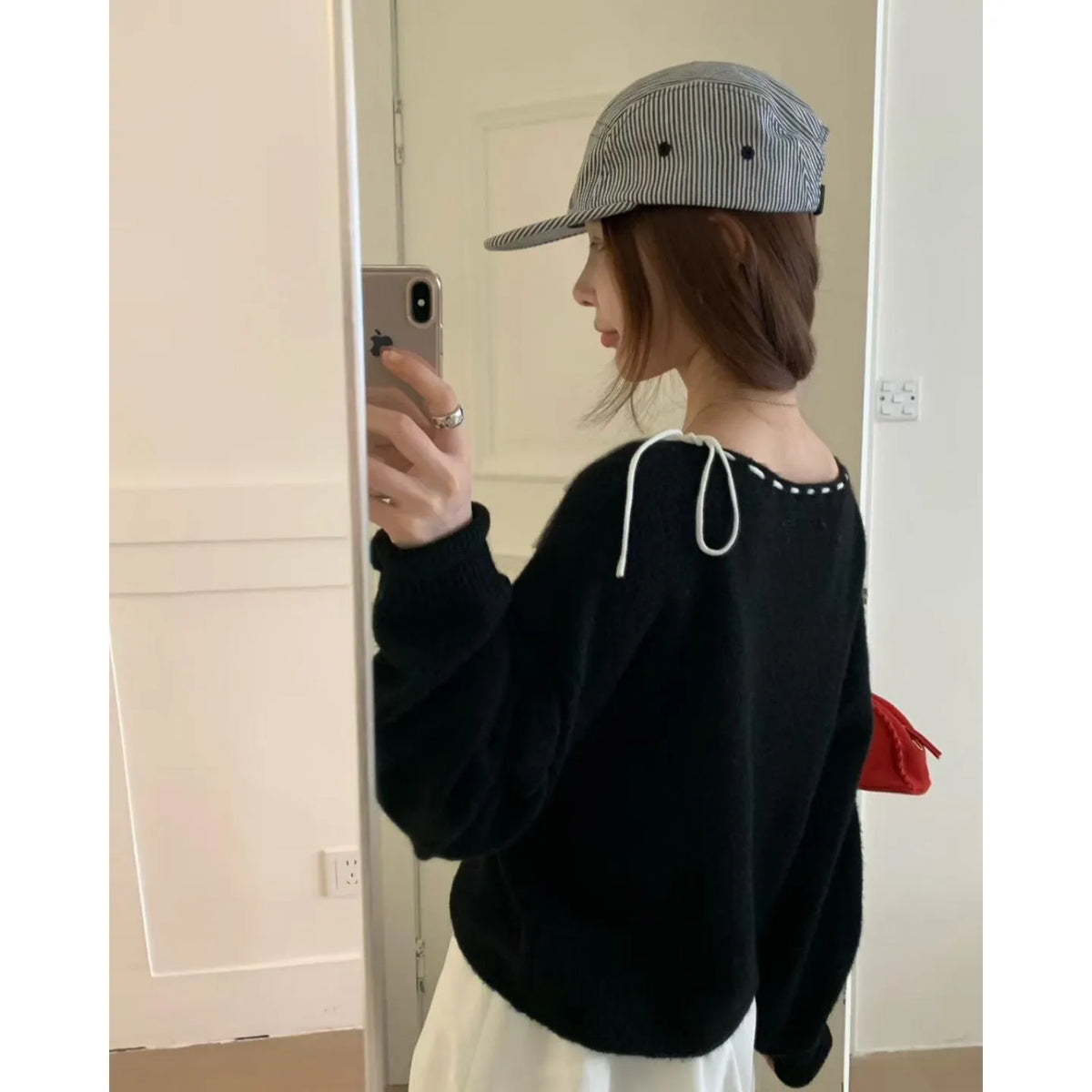 Women's grey loose-fitting pullover knitwear with relaxed sleeves and crew neck