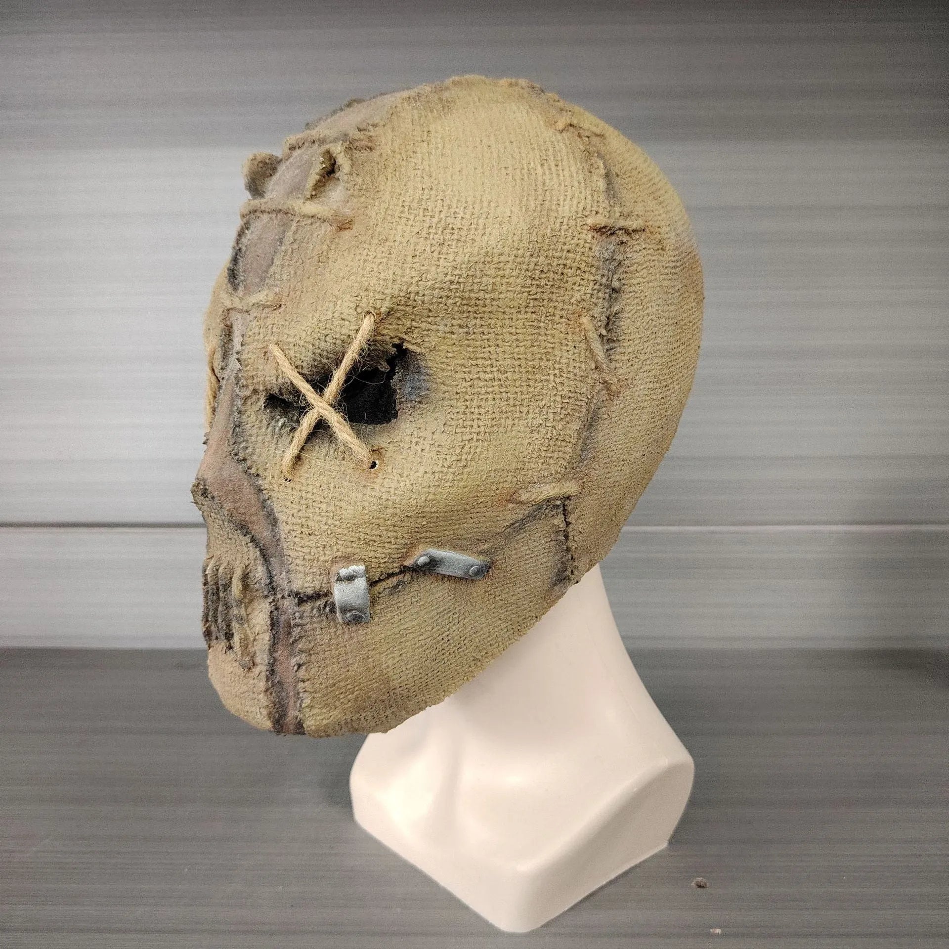 Latex horror mask with scar skull design covering full head, dimensions 31cm by 25cm