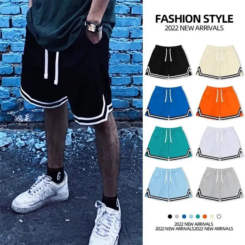 Men's loose-fit polyester sports shorts in various colours on a size chart background