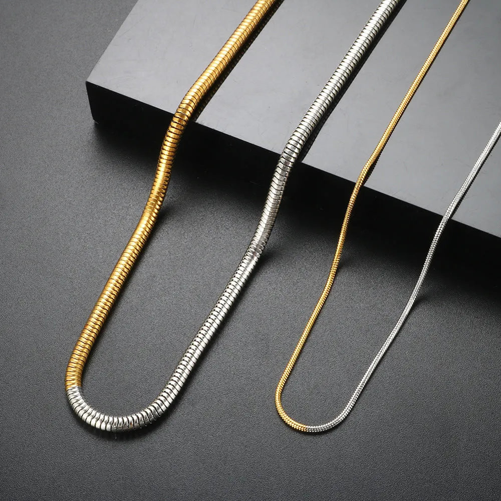 Women's stainless steel snake bones chain necklace with geometric design in gold colour
