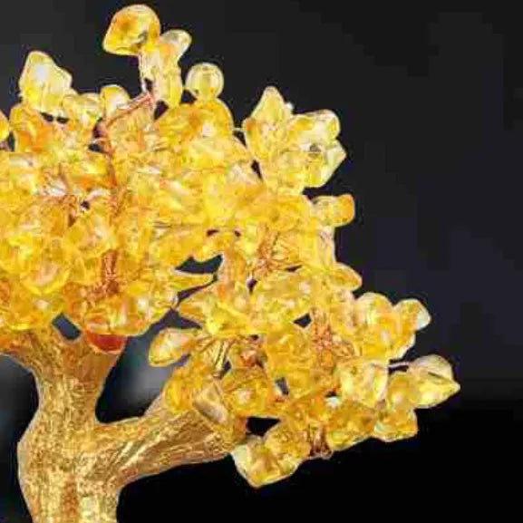 Citrine-coloured resin money tree ornament with a small turtle, measuring 18 by 23 cm.