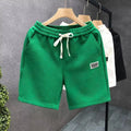 Men's casual sports shorts in white, black, or green with micro-elastic polyester fabric