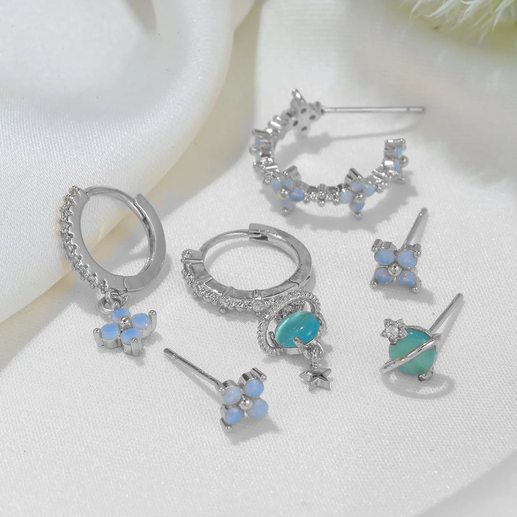 Gold and silver flower nail design ear studs with zircon mosaic accents in Japanese Korean style