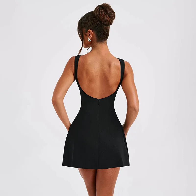Woman wearing a sleeveless high-waist backless mini dress in black polyester fabric