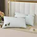 A polyester pillow core in light blue, shown alongside size and weight options for 48x74cm and 42x70cm pillows.