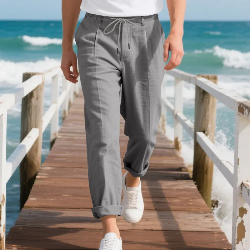 Men's straight-leg linen casual trousers in light khaki colour with a drawstring waist.