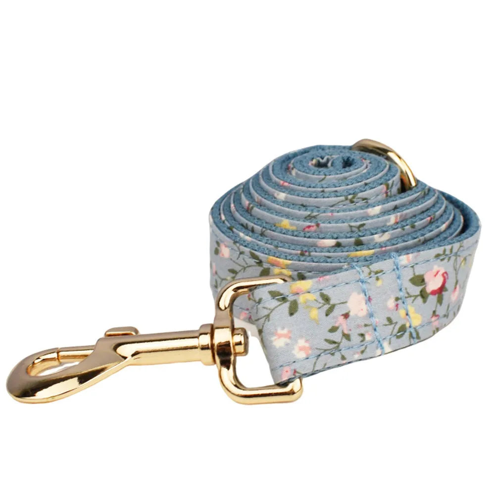 Blue floral polyester cotton dog collar set with matching leash, bow, vest and accessories