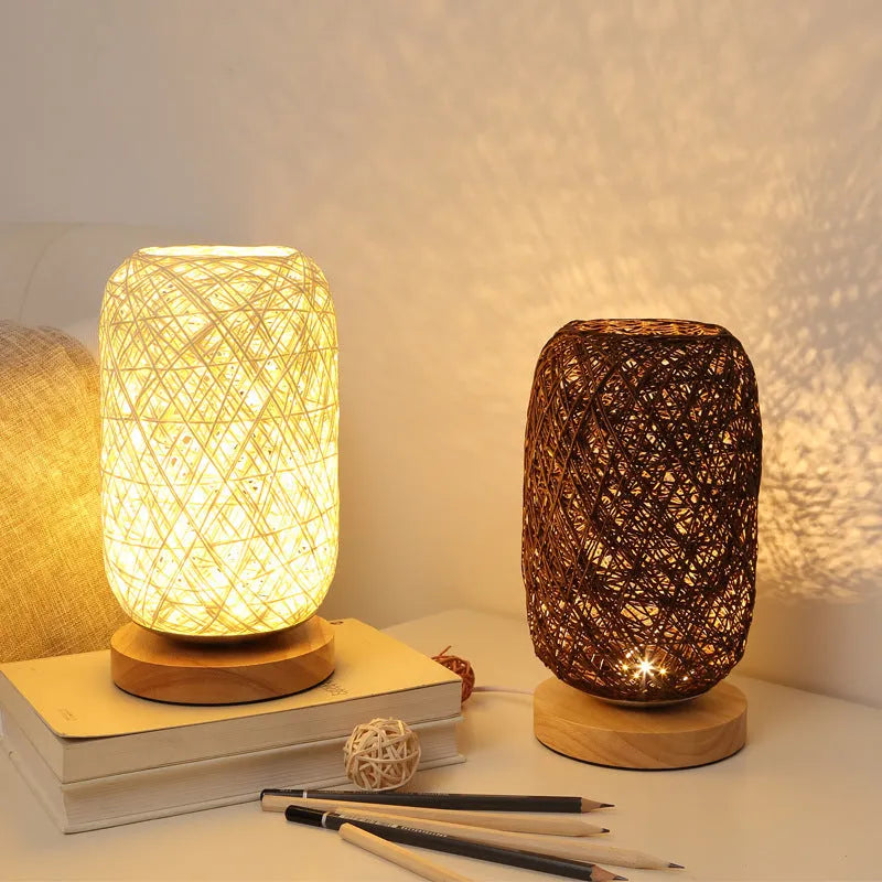 Brown hemp rope desk lamp with spherical shade on circular wood base