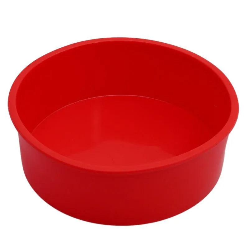 Set of three round red silicone cake moulds in 4-inch, 6-inch, and 8-inch sizes.