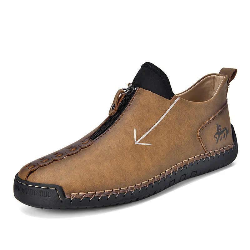 Men's black leather martin boots with front zipper and round toe design on rubber sole
