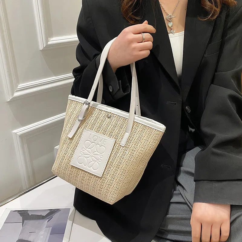Spring straw woven women's large capacity shoulder bag in European American retro style with three-dimensional pocket