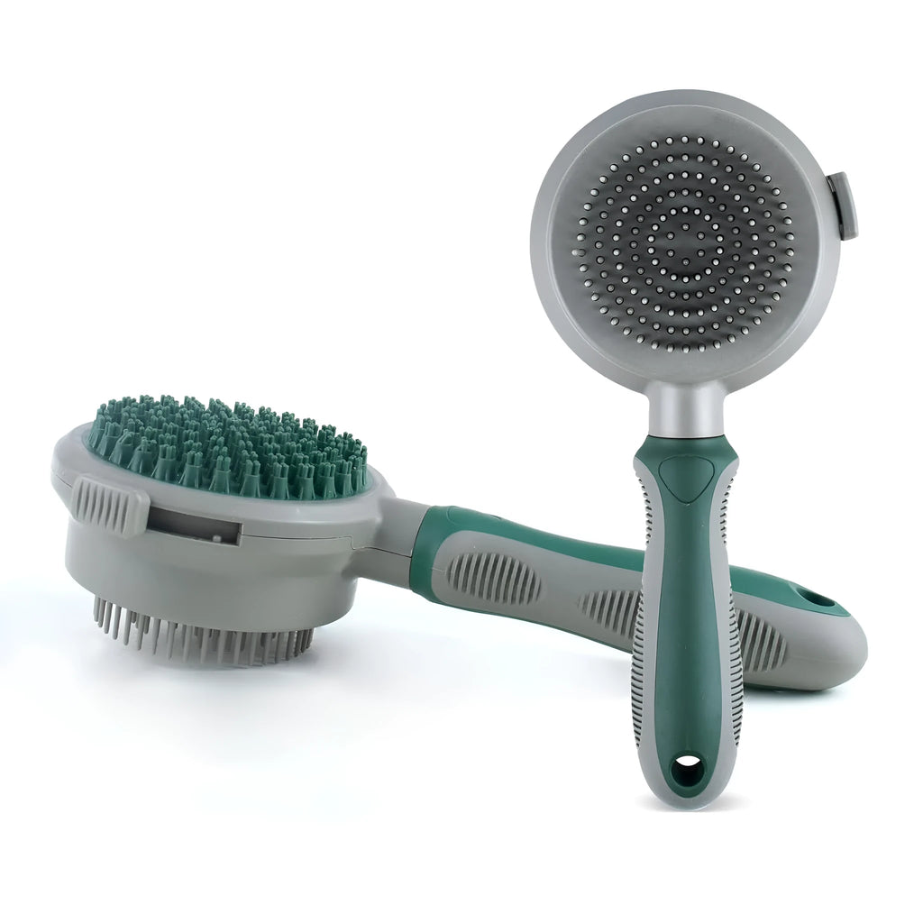 Green and pink 2-in-1 silicone cat grooming brush showing slicker brush and massager sides