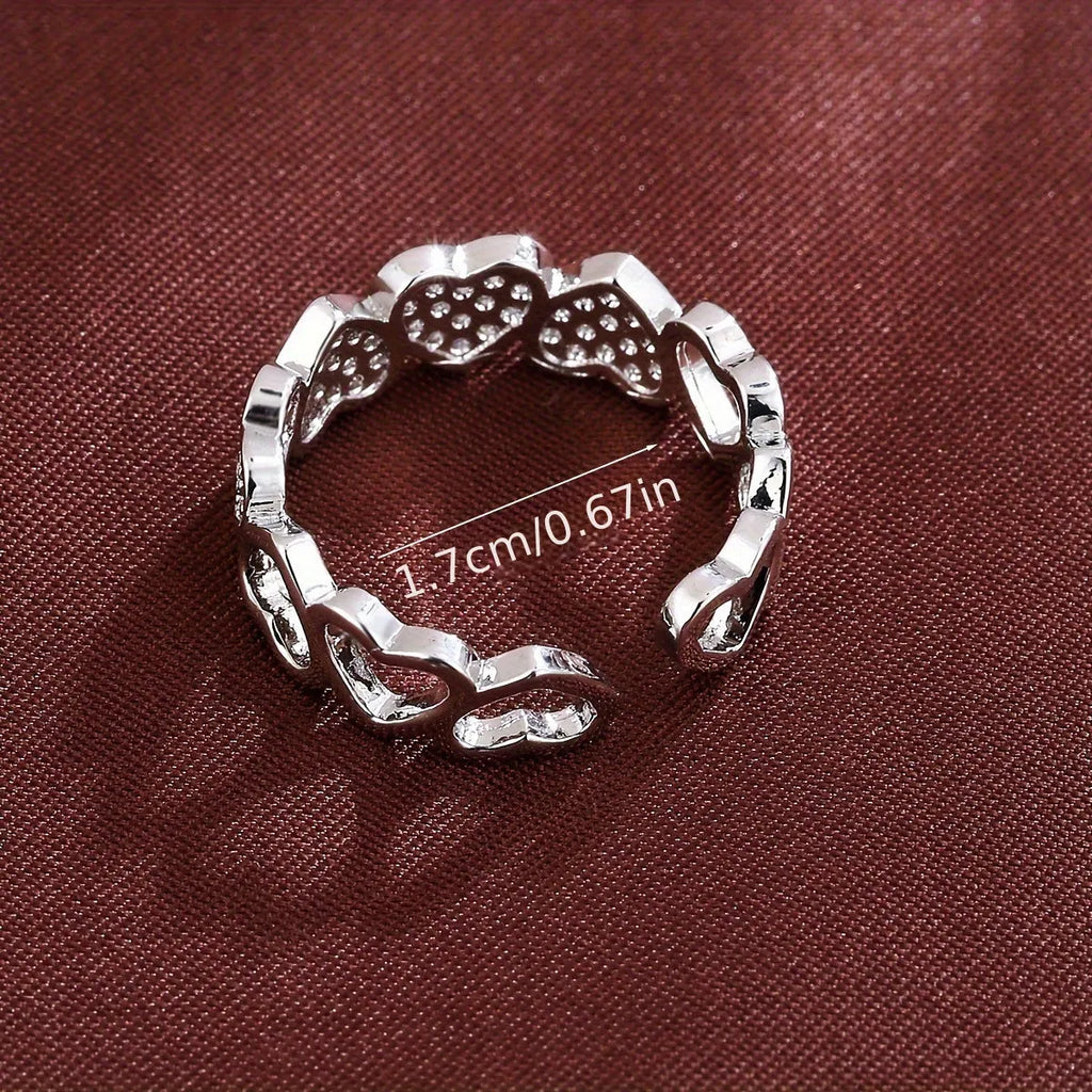 Adjustable opening geometric couple's ring with love/heart design in gold or silver colour