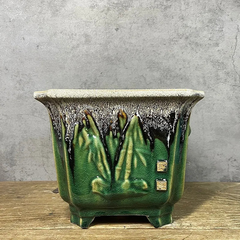 Square ceramic decals stoneware flower pot 22cm, green glaze change finish, placed on wooden desktop with small plant inside