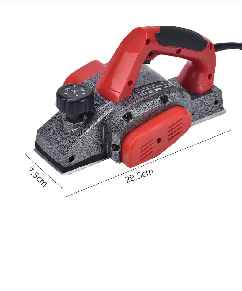Red household desktop electric push planer tool with aluminium shell for woodworking.