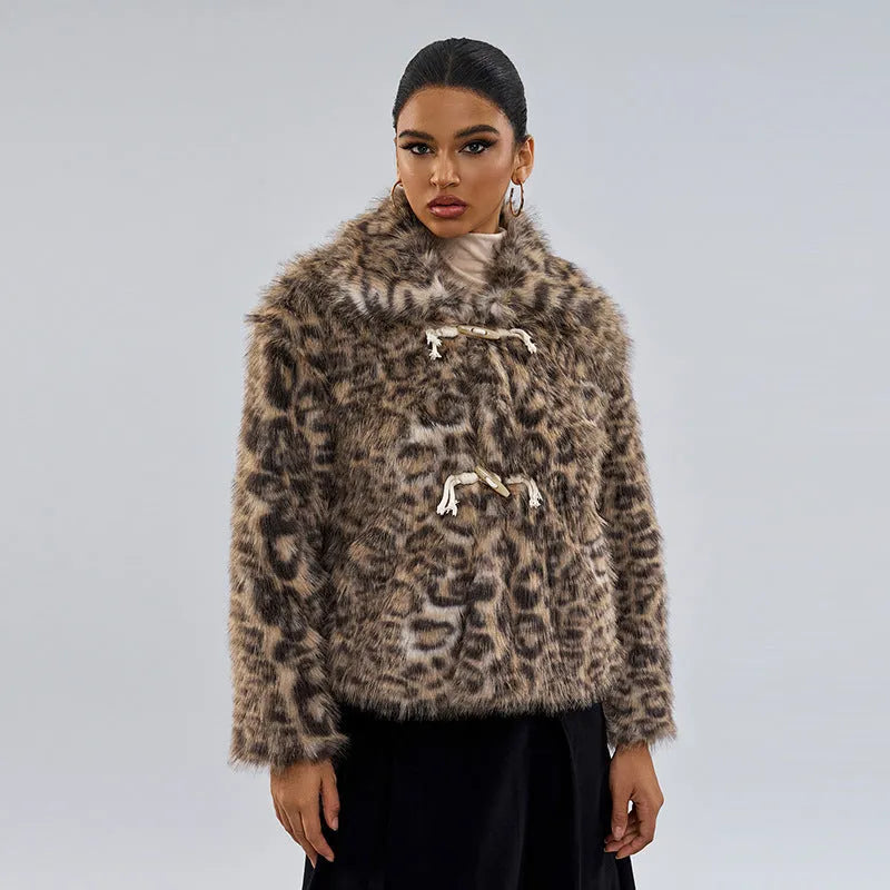 Women's leopard print polyester coat with regular sleeves on a hanger