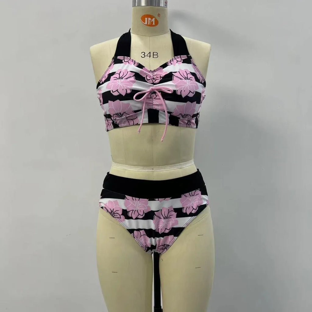 Black printed women's bikini swimsuit with belly covered slimming design.
