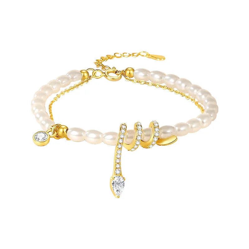 Pearl snake beaded bracelet in 925 sterling silver with electroplated gold finish and geometric animal design