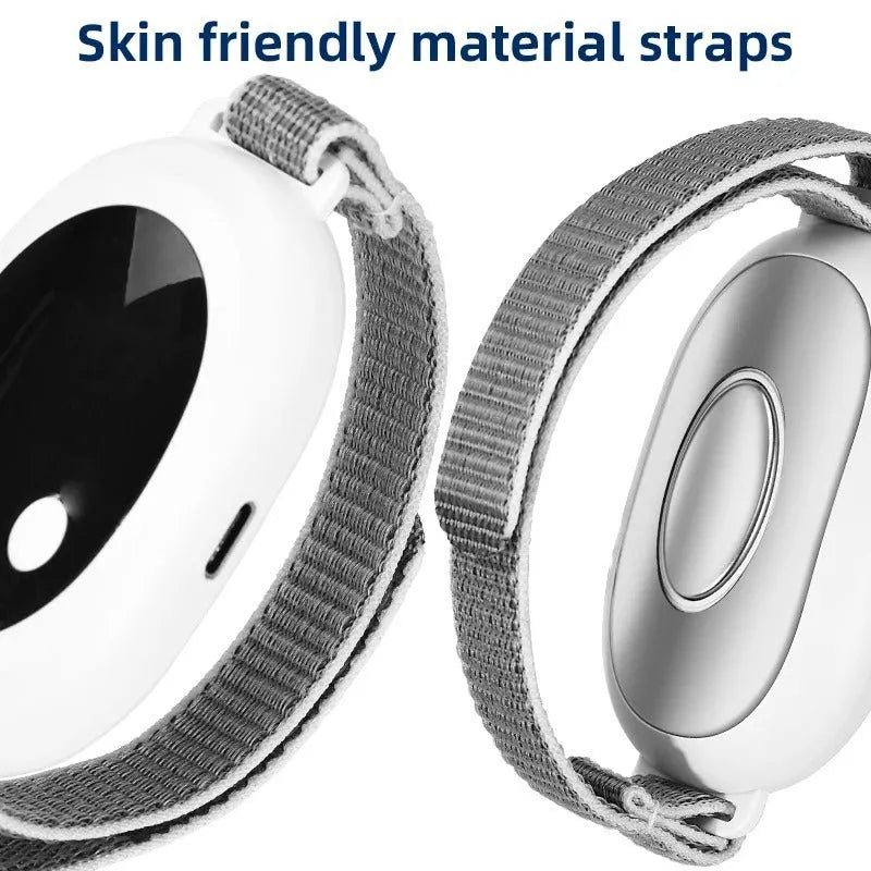 White handheld remote control sleep aid device with attached charging cable and wearable wrist bracelet.