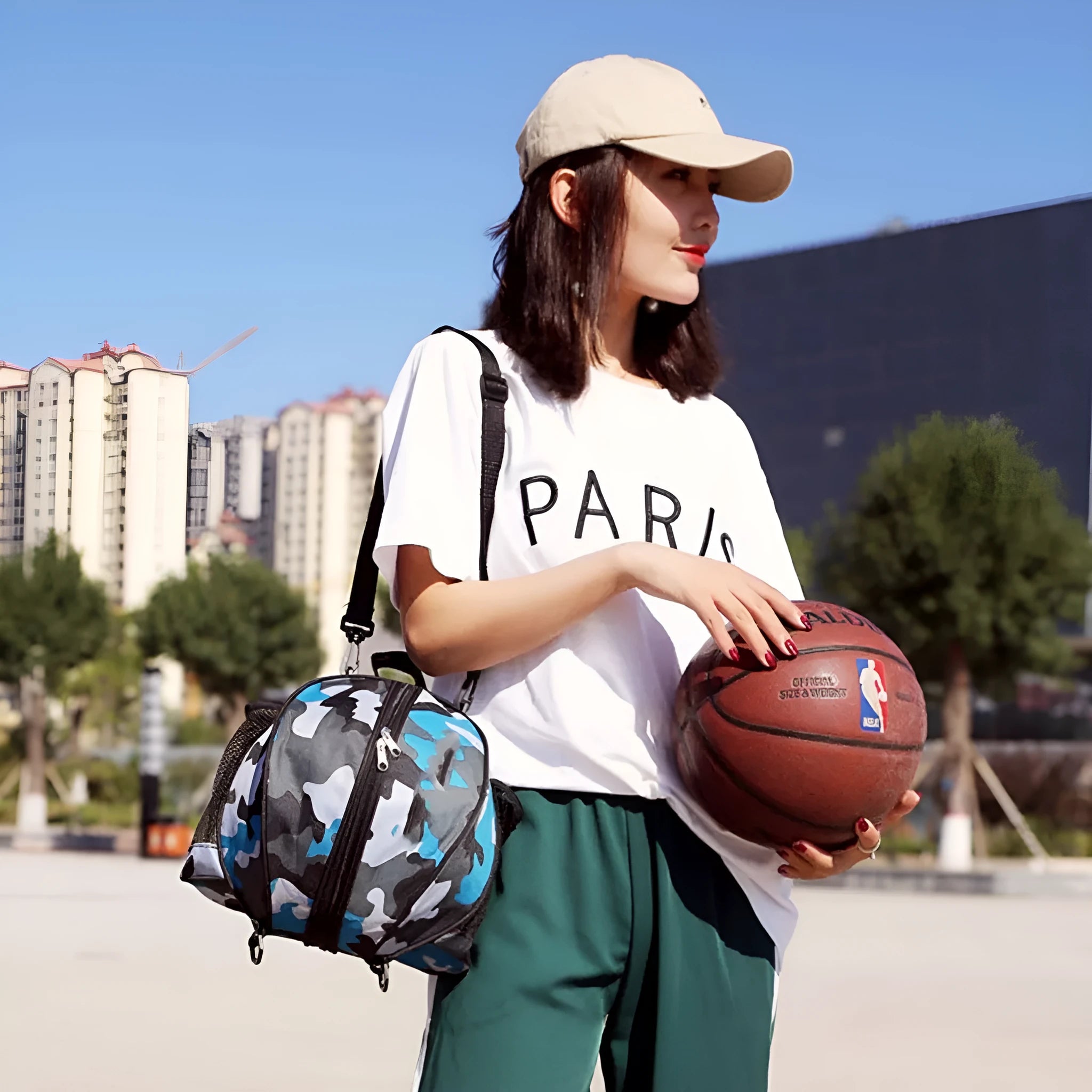 Oxford cloth basketball training bag with adjustable strap shown in a camouflage colour option.