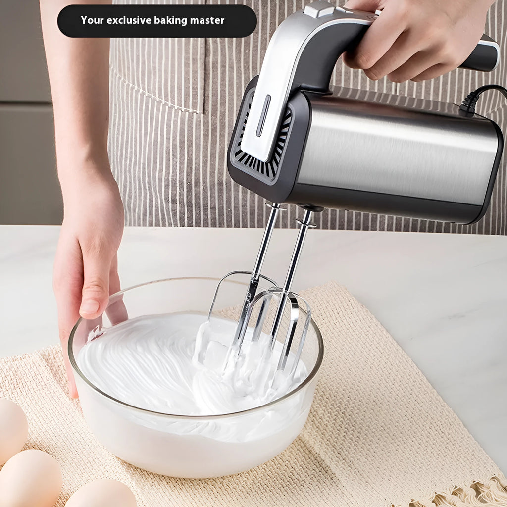 Silver handheld electric whisk with stainless steel beaters on a five-speed dial.