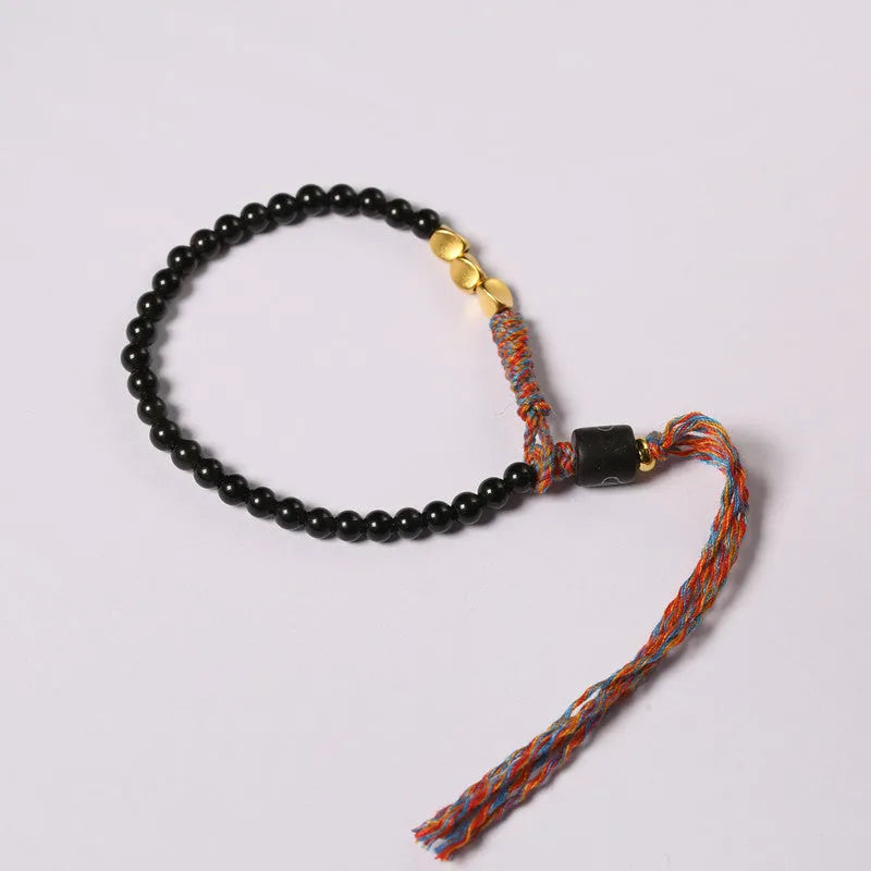 Hand-woven obsidian colour bracelet with 4mm width and 15.5-16cm length shown as wearable accessory
