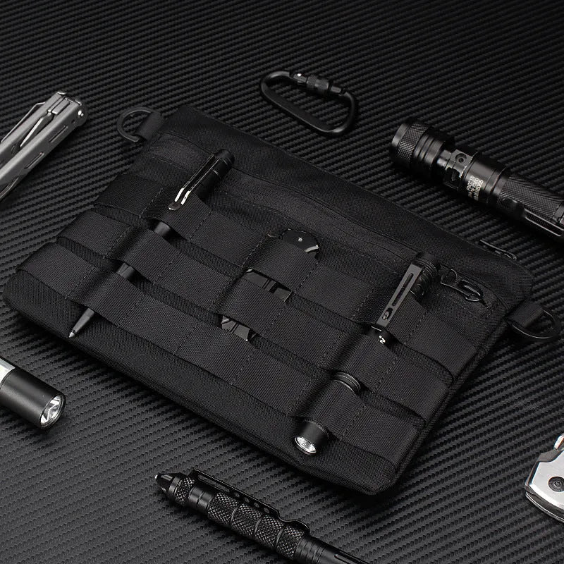 Black multifunctional outdoor kit made of Oxford cloth, measuring 18cm x 3.5cm, designed for military and camping use.