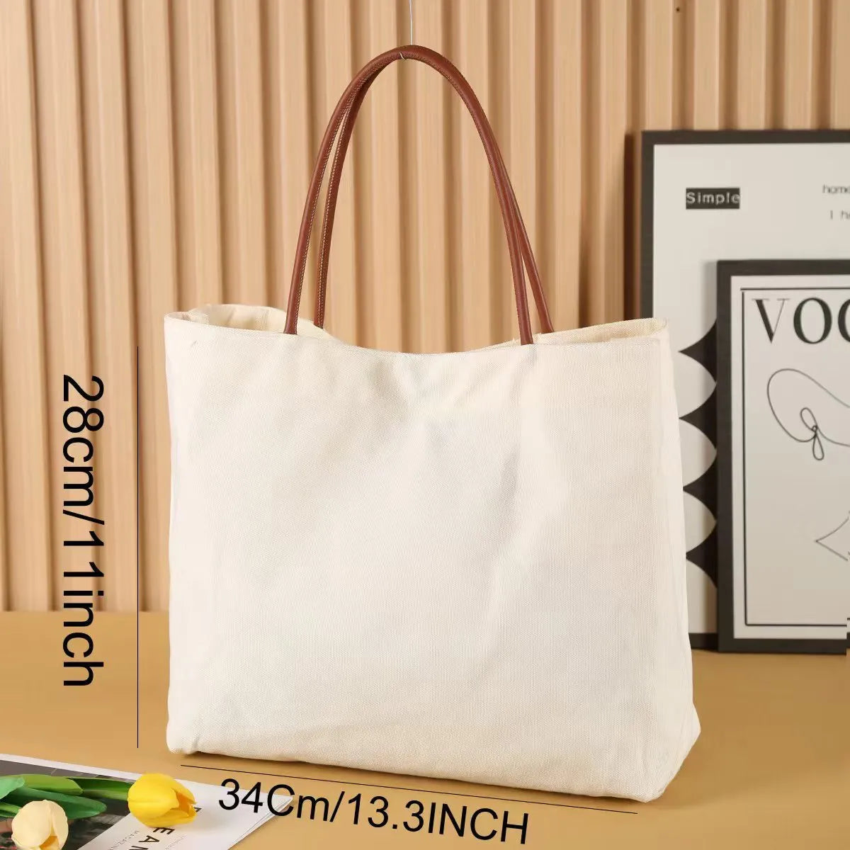 Heavy-duty natural cotton canvas tote bag with flat base and long handles in beige white colour.