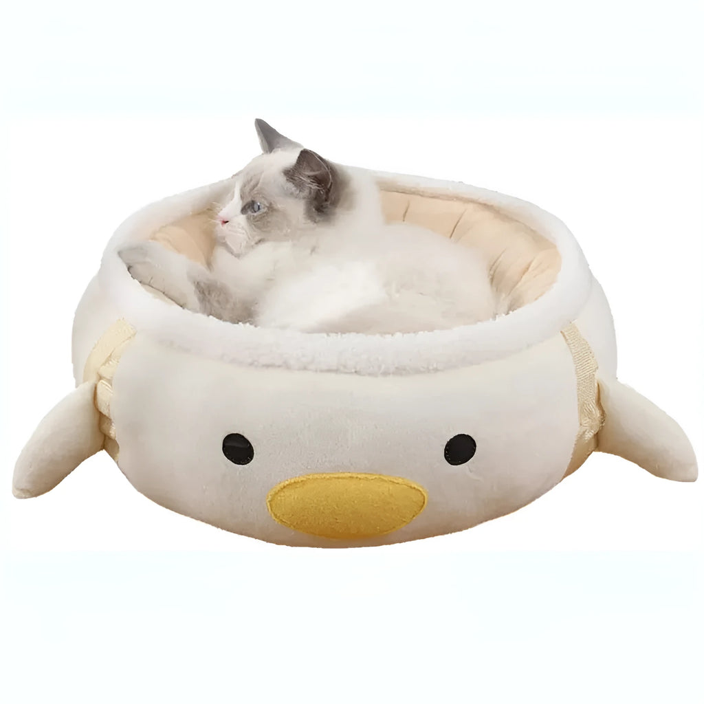 Green chick dinosaur shaped cat bed that can be used flat or hung as a hammock