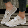 Women's creamy white casual sneakers with fabric upper and rubber sole