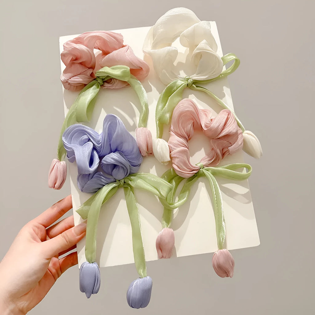 Children's knitted fabric headband with tulip element in Korean style, shown in beige, pink or purple colour option