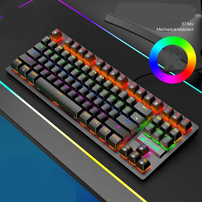 Black, white, blue, and pink coloured mechanical keyboards on a desk
