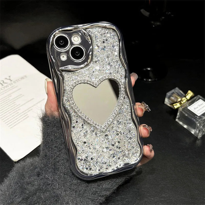 Silver grey TPU phone case with heart-shaped mirror insert and cream high flash epoxy shell for iPhone