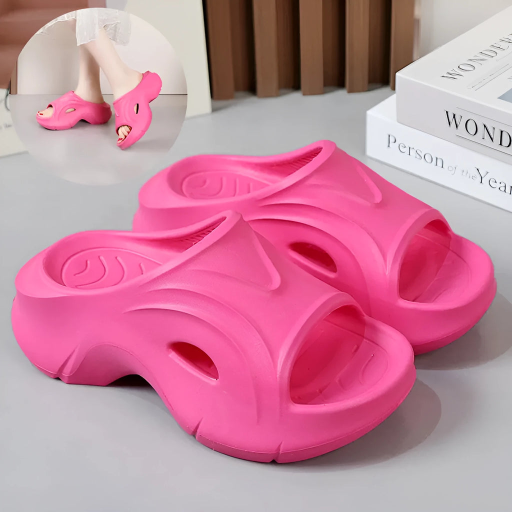 Women's white thick-soled EVA slippers with round toe on a beach background