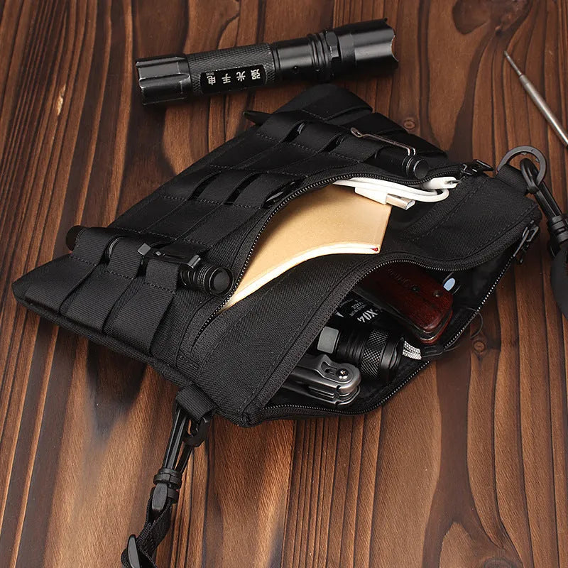 Black multifunctional outdoor kit made of Oxford cloth, measuring 18cm x 3.5cm, designed for military and camping use.