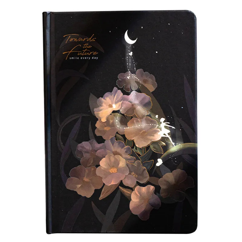 A5 diary notebook with luminous holographic cover open to show pages with colour illustrations.
